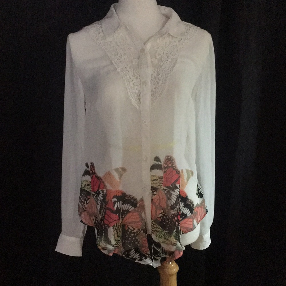 3 work shirts.  Butterflies, blue and knit.